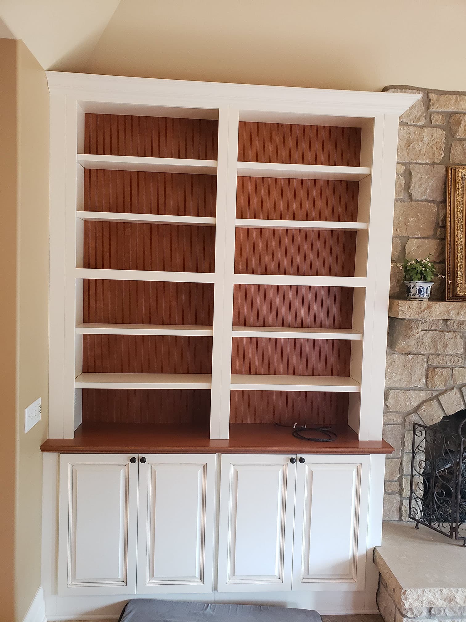 Custom built-in bookcase with white bookcase remodel by Professional Wood Interiors - St. Louis, MO