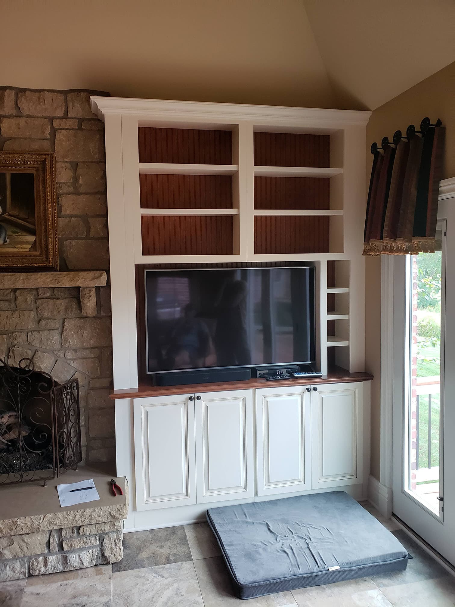 Custom built-in bookcase with white bookcase remodel by Professional Wood Interiors - St. Louis, MO