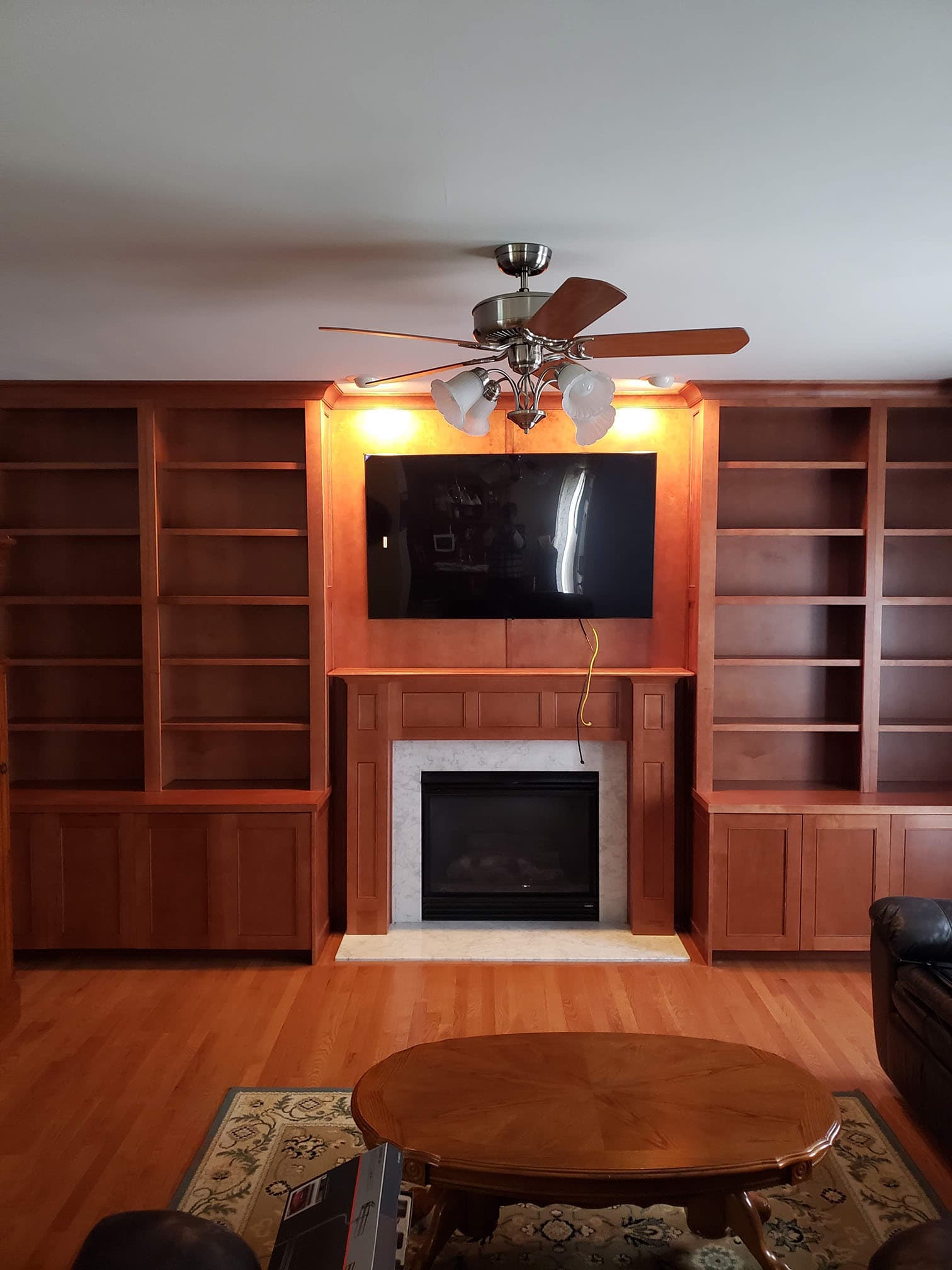 Custom entertainment center with adjustable shelving - Professional Wood Interiors - St. Louis, MO