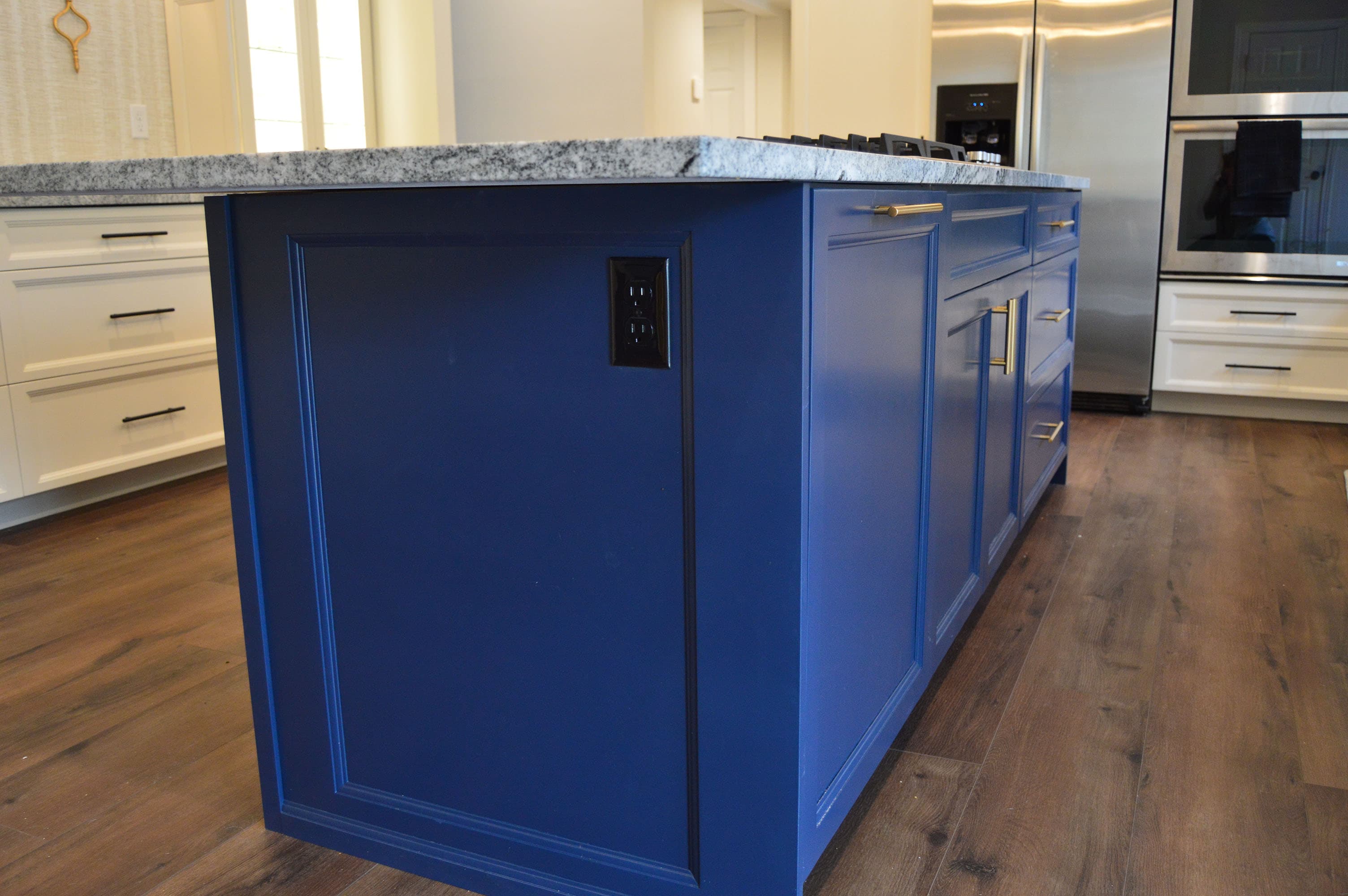 Custom St. Louis kitchen with handcrafted solid-wood cabinetry and island by Professional Wood Interiors.